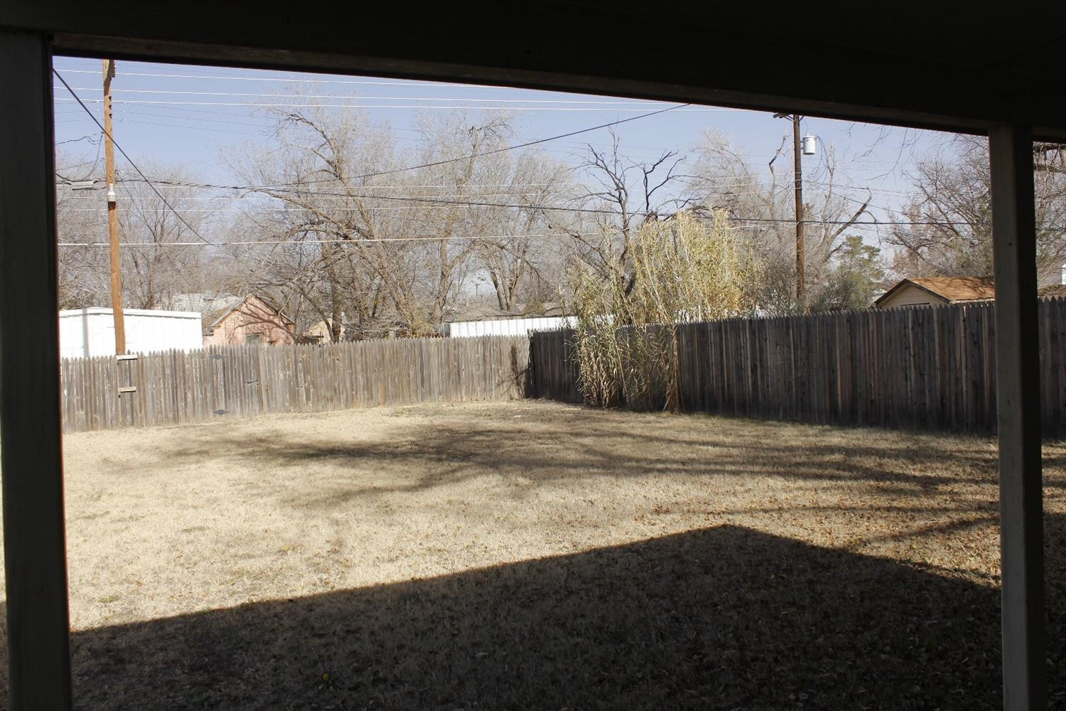 2222 22nd Street Lubbock, TX 79411 - Photo 8 of 9 a view of a backyard of the house