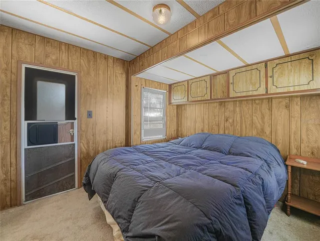 a room with gym equipment and a large window