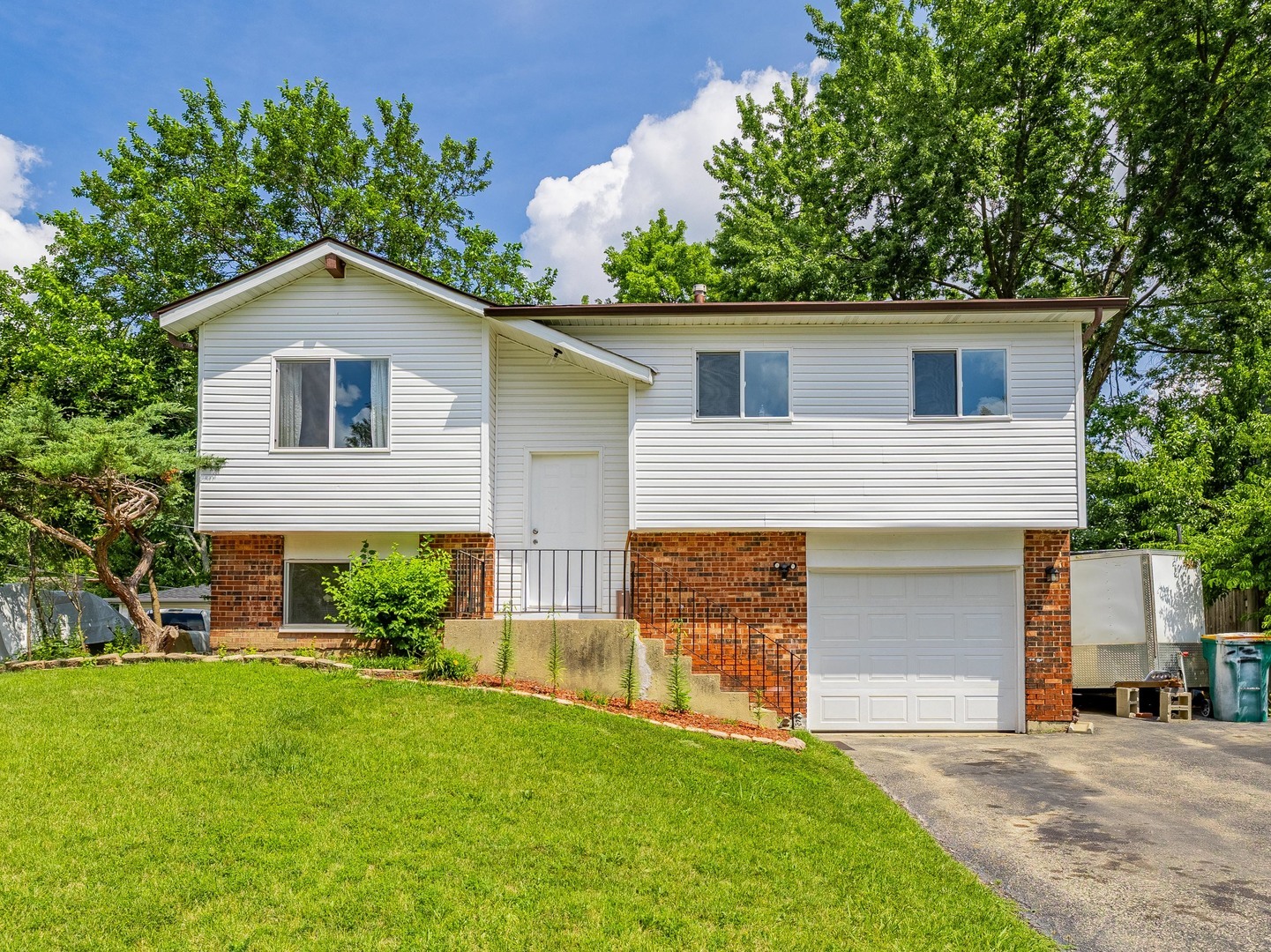 228 Riverside Drive Bolingbrook, IL 60440 - Photo 1 of 22 front view of a house with a yard