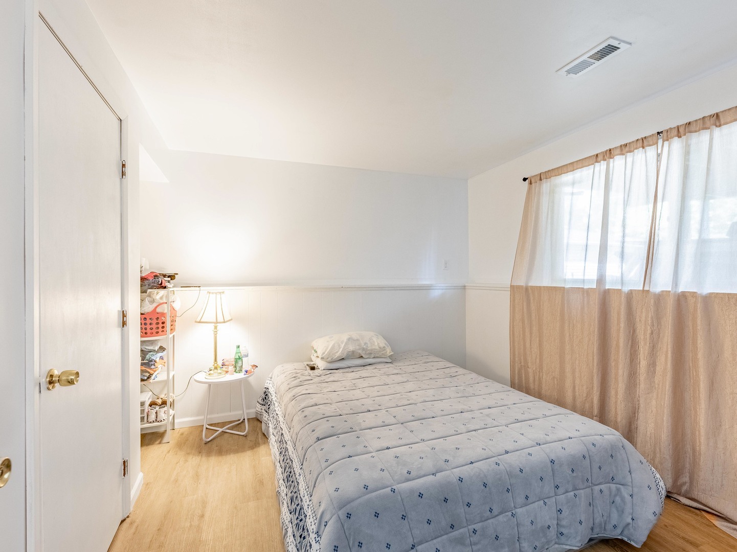 228 Riverside Drive Bolingbrook, IL 60440 - Photo 15 of 22 a bedroom with a bed and a large window