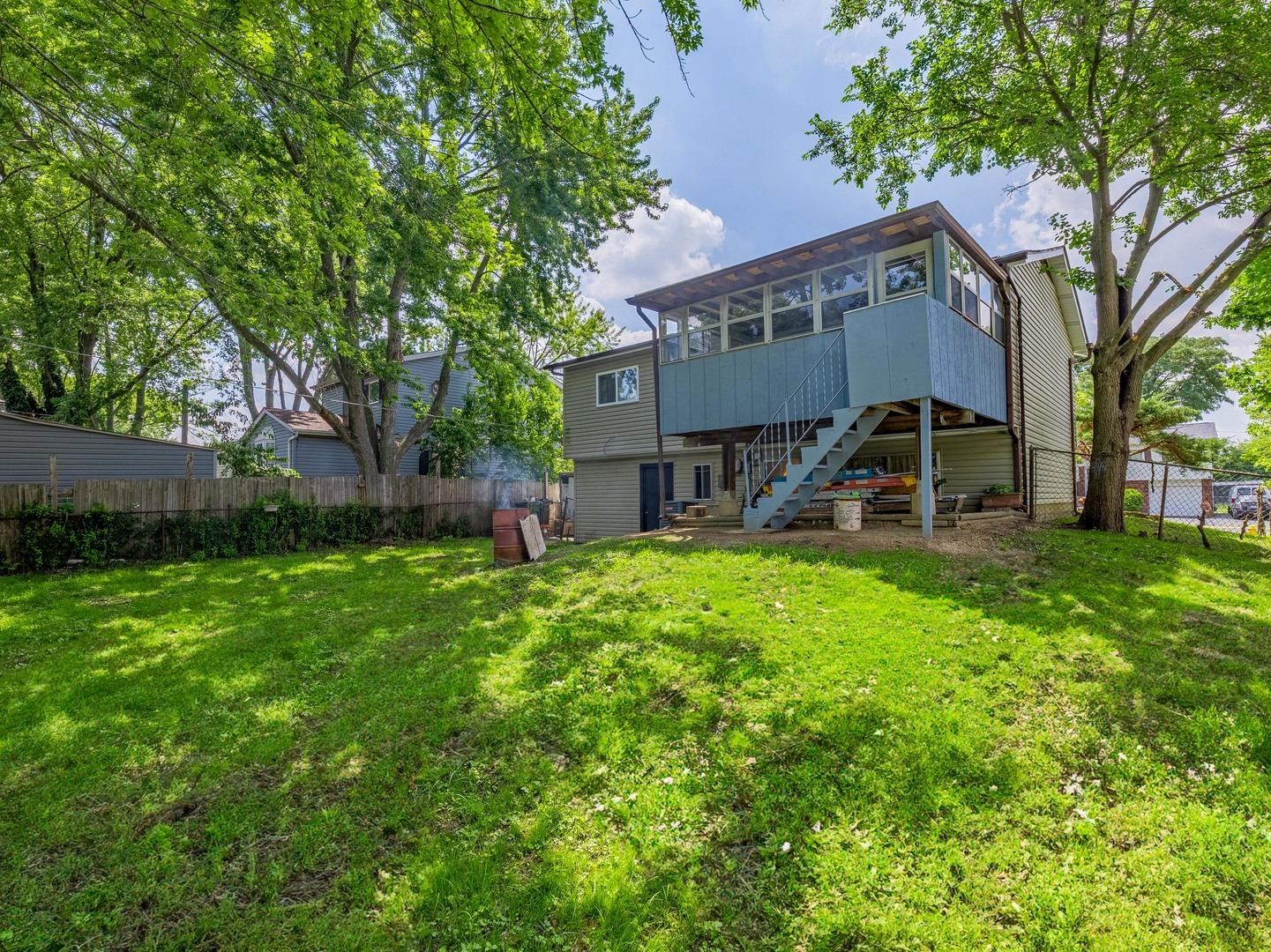 228 Riverside Drive Bolingbrook, IL 60440 - Photo 20 of 22 a view of a house with a yard