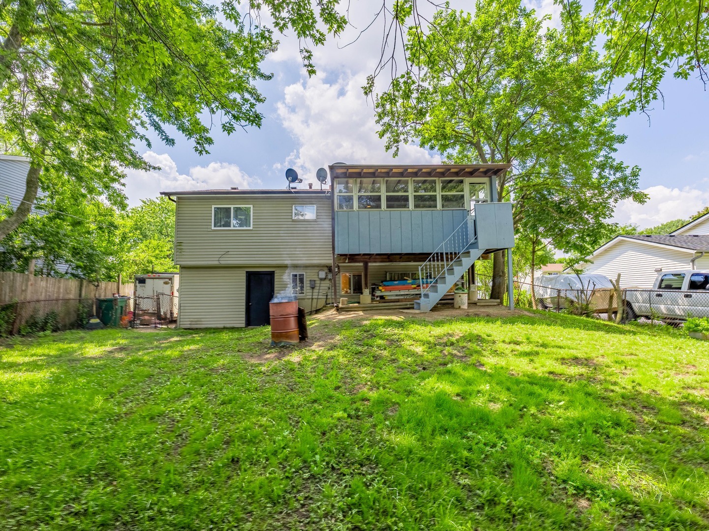 228 Riverside Drive Bolingbrook, IL 60440 - Photo 21 of 22 a front view of house with yard and seating area