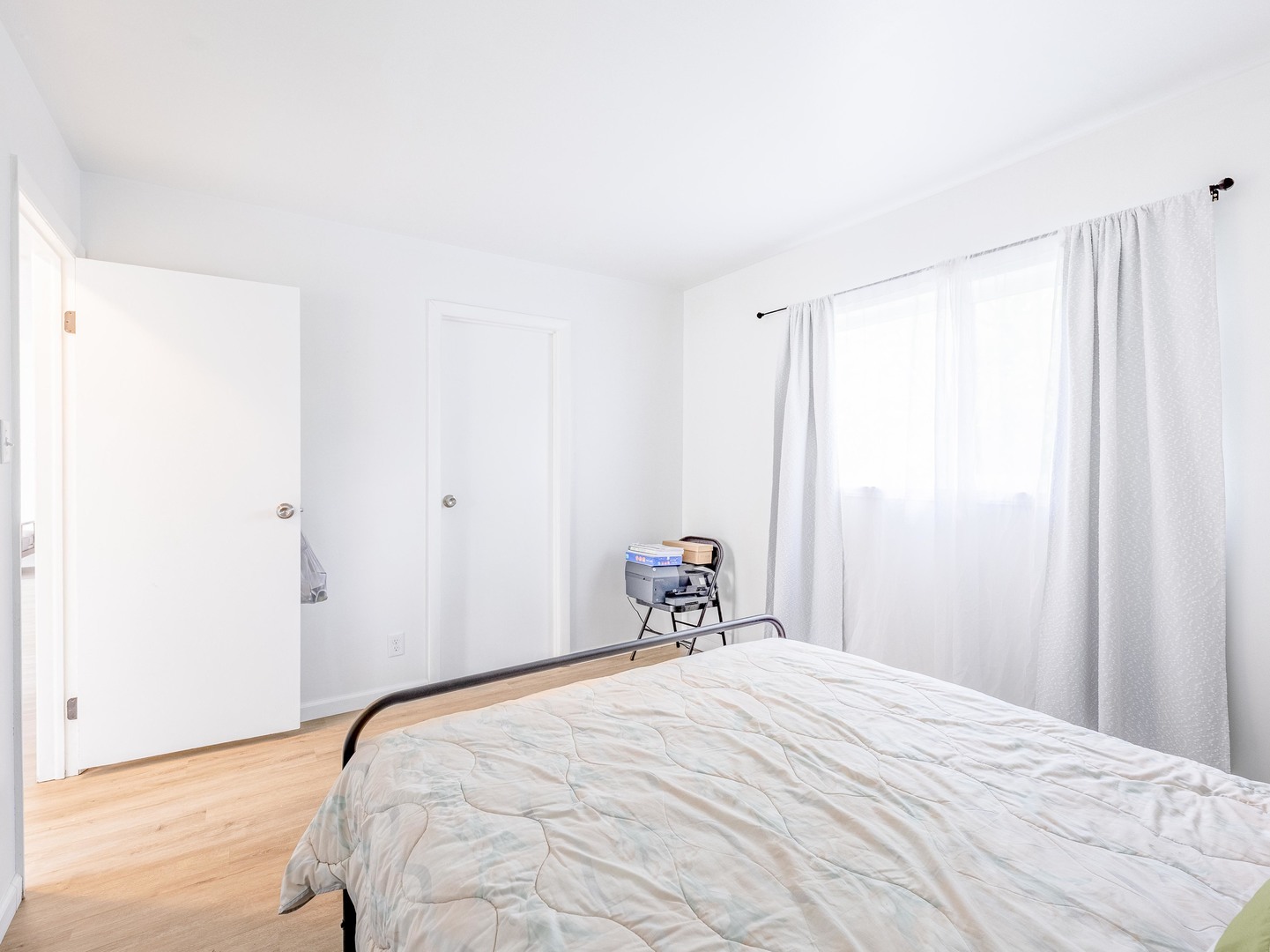 228 Riverside Drive Bolingbrook, IL 60440 - Photo 9 of 22 a bedroom with a bed and a window