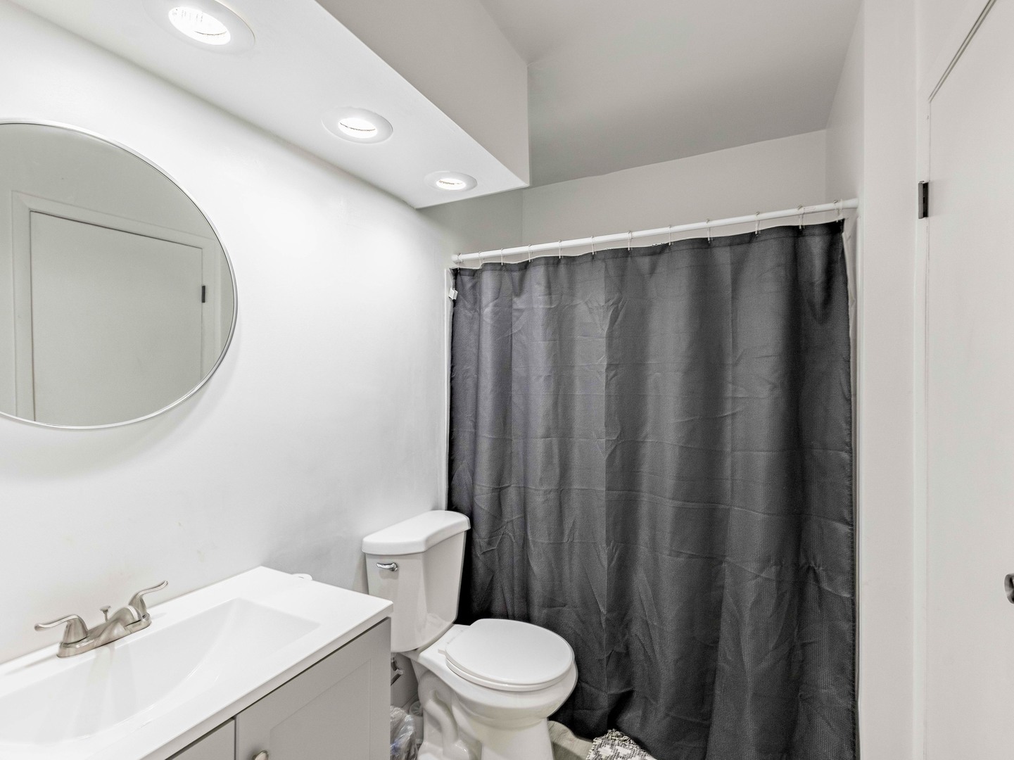 228 Riverside Drive Bolingbrook, IL 60440 - Photo 10 of 22 a bathroom with a sink and a mirror