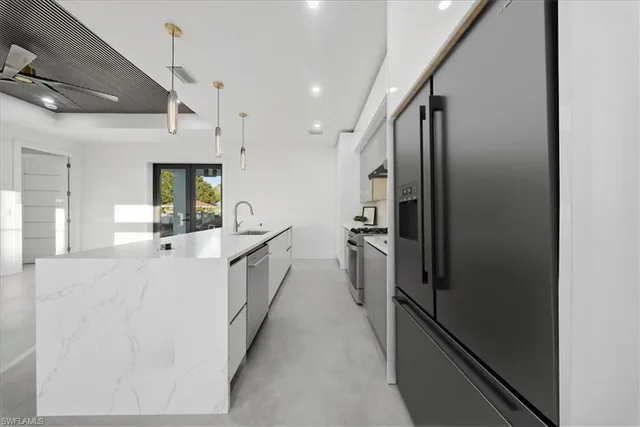 an empty room with windows and view