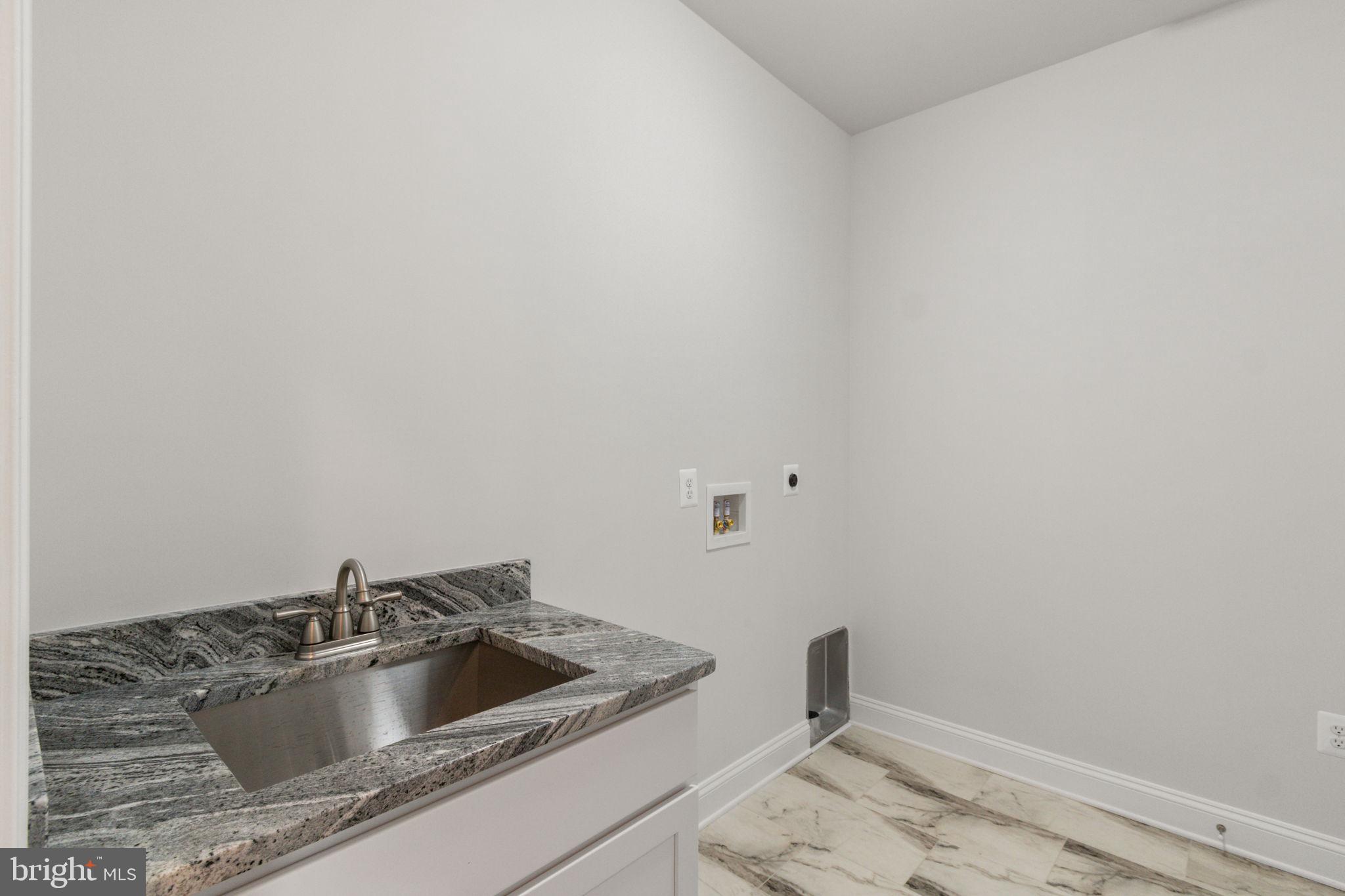 2012 Dozer Lane Catlett, VA 20119 - Photo 68 of 92 Laundry Room/Mud Room Wet Sink Cabinet