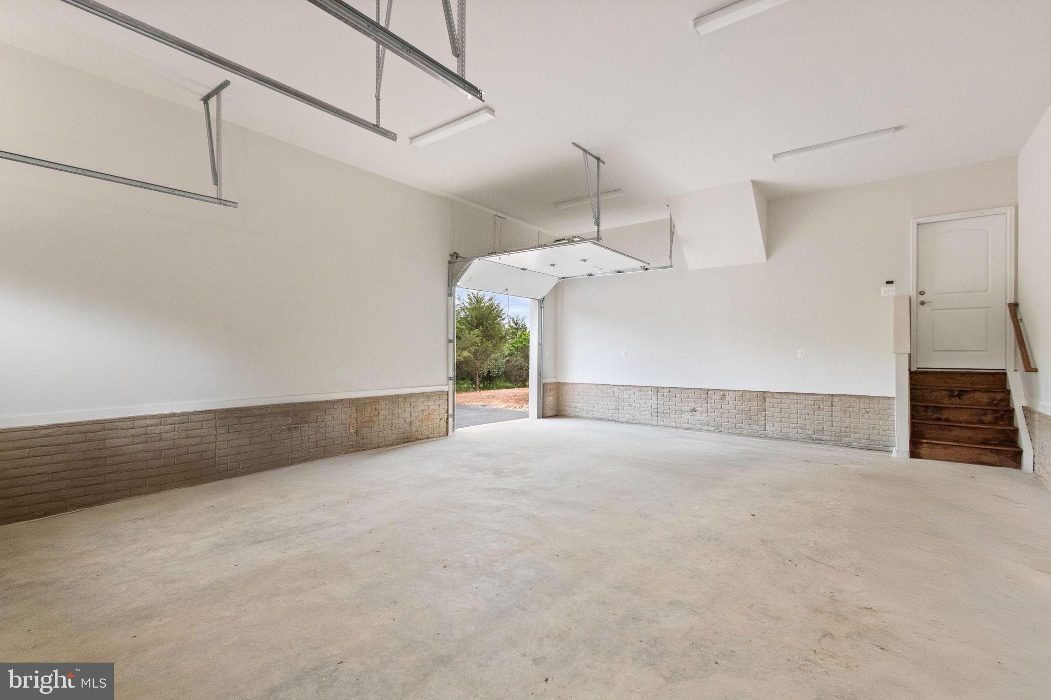 2012 Dozer Lane Catlett, VA 20119 - Photo 73 of 92 Spacious 3 Car Garage!!! TALL CEILINGS!