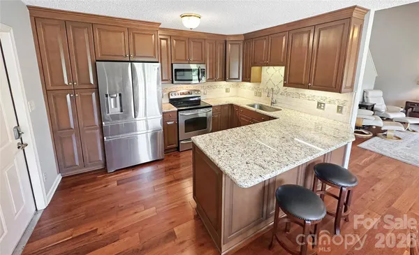 a bathroom with a sink and shower