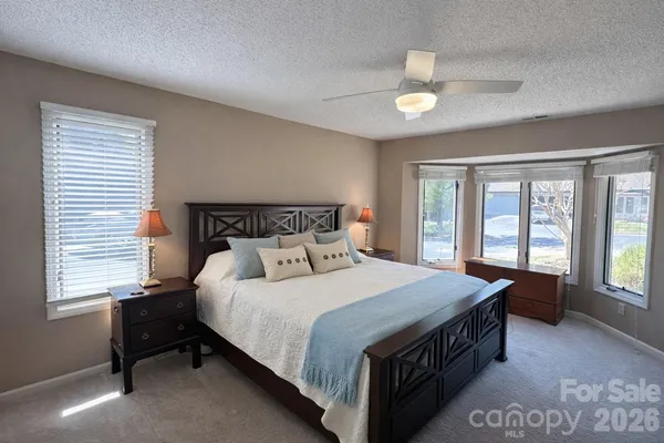 a view of a balcony with wooden floor and pool table and chairs