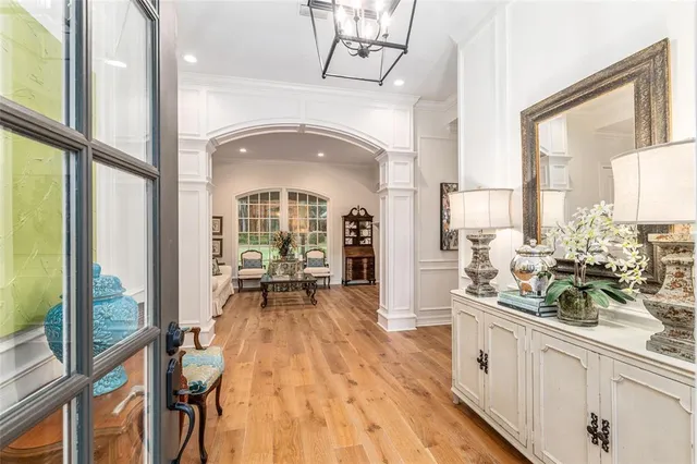 a living room with furniture fireplace and flat screen tv