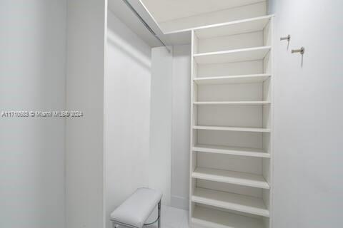 100 Lincoln Road, Unit 739 Miami Beach, FL 33139 - Photo 14 of 33 a view of walk in closet with empty racks
