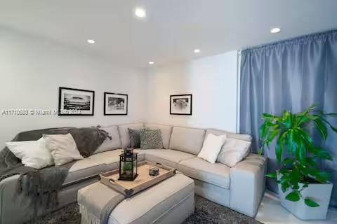 100 Lincoln Road, Unit 739 Miami Beach, FL 33139 - Photo 19 of 33 a living room with furniture and a couch