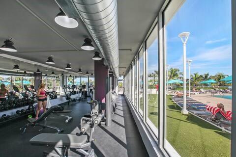100 Lincoln Road, Unit 739 Miami Beach, FL 33139 - Photo 29 of 33 a view of a room with gym equipment