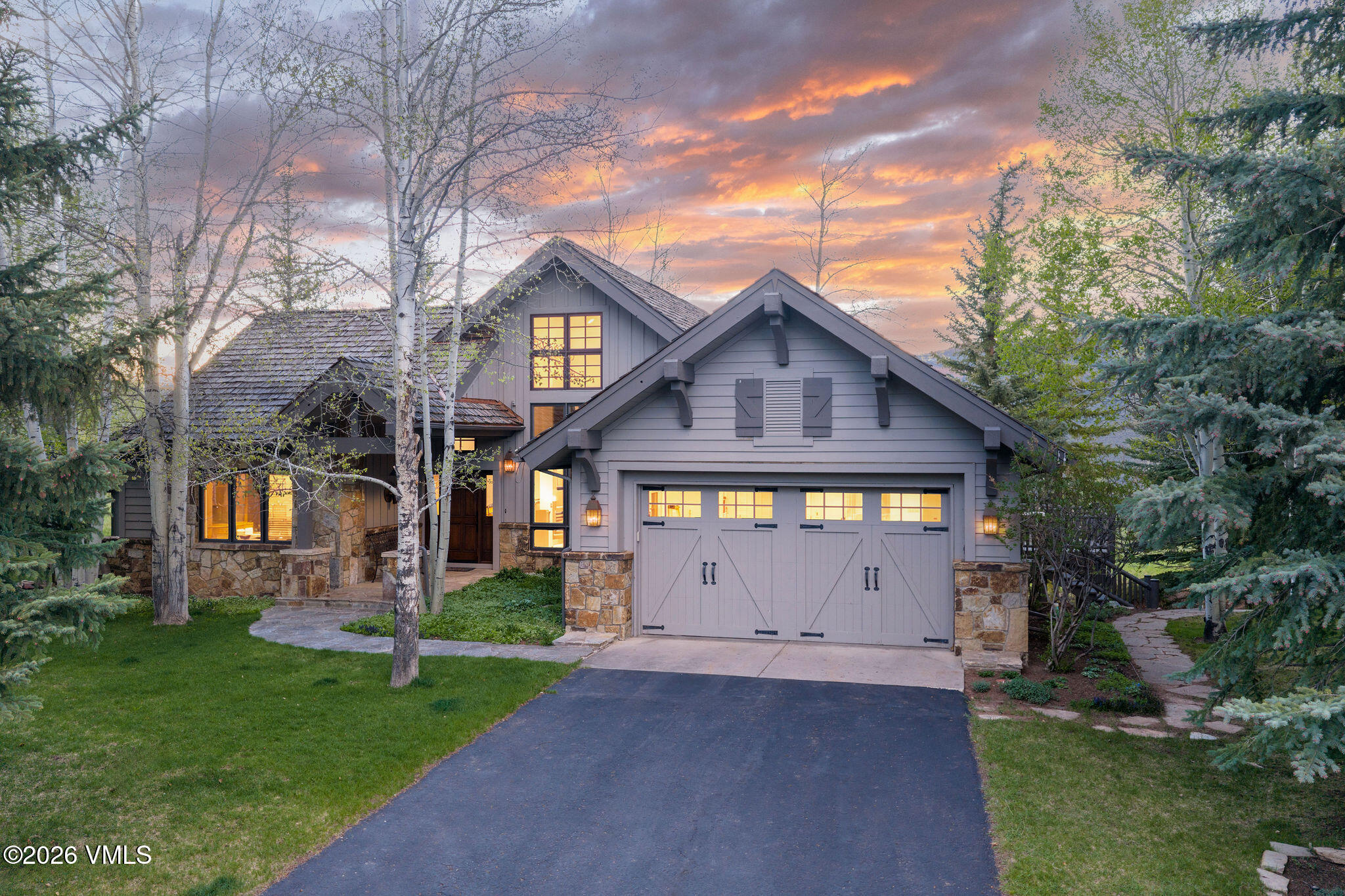 102 Saddle Ridge Loop Edwards, CO 81632 - Photo 27 of 29 a view of house with a outdoor space and a garden