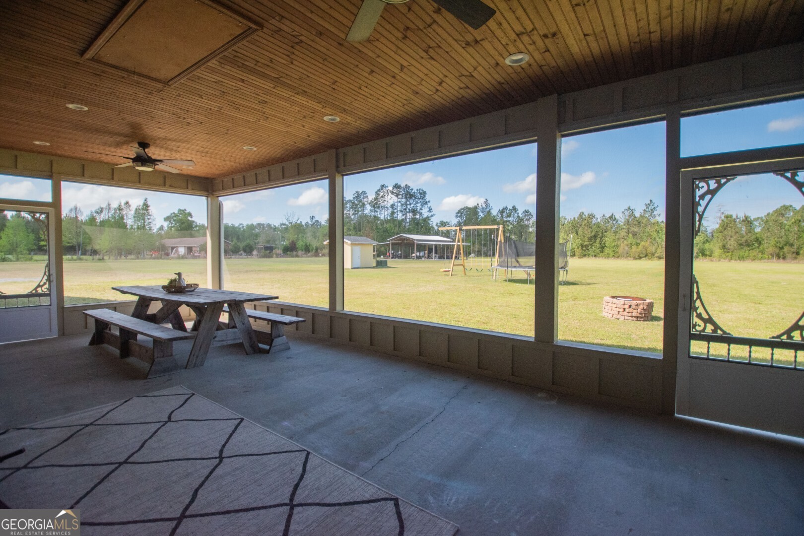 6213 Spanish Creek Road Folkston, GA 31537 - Photo 15 of 38 a lobby with table and chairs
