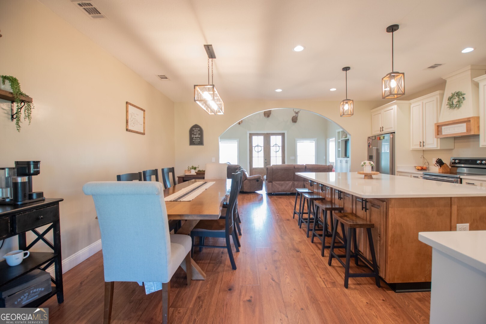 6213 Spanish Creek Road Folkston, GA 31537 - Photo 16 of 38 a large kitchen with a table and chairs