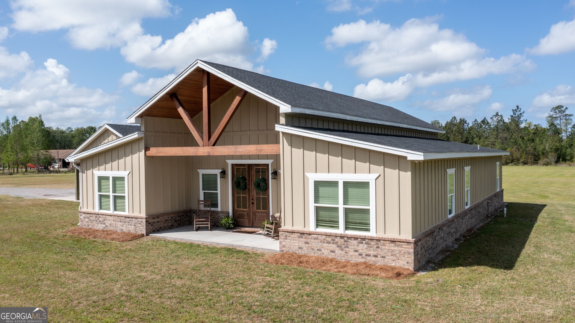 6213 Spanish Creek Road Folkston, GA 31537 - Photo 2 of 38 a view of a house with backyard porch and sitting area
