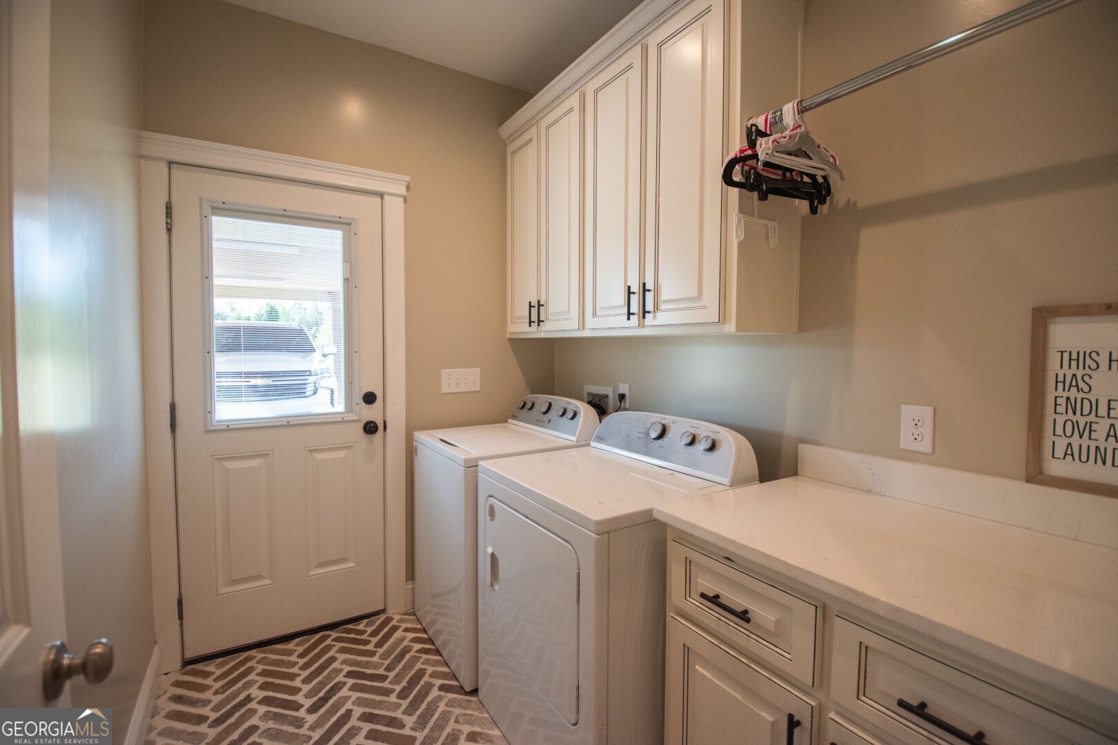 6213 Spanish Creek Road Folkston, GA 31537 - Photo 26 of 38 a view of storage and utility room with two washing machine