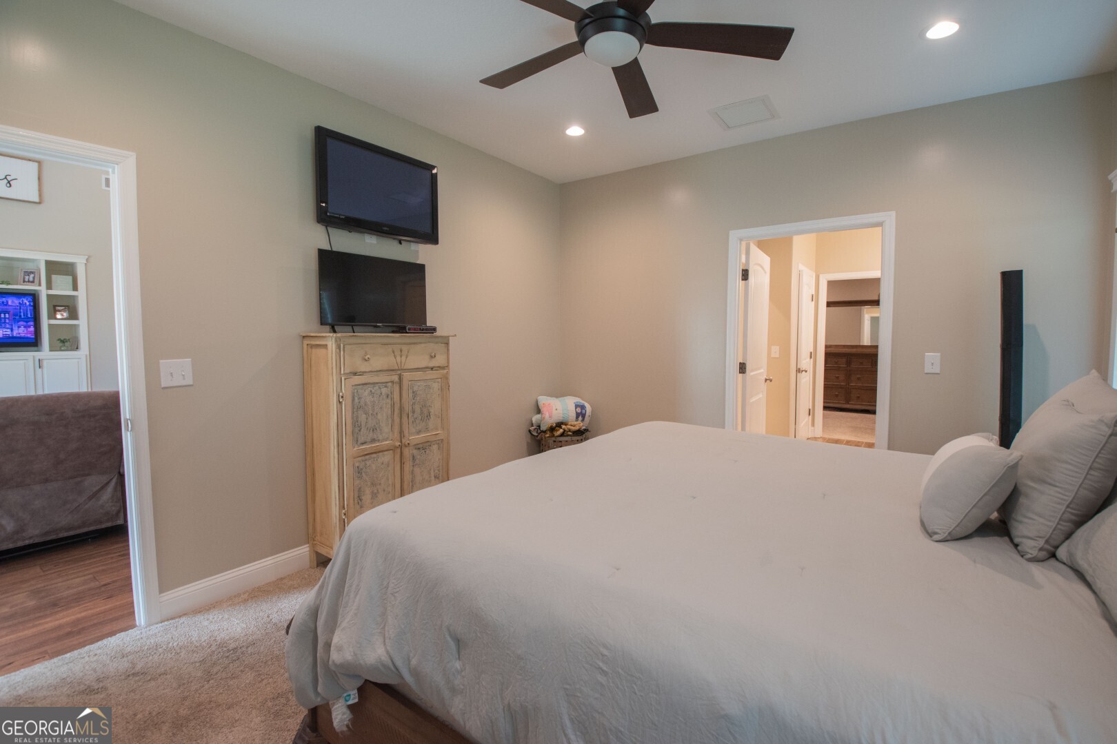 6213 Spanish Creek Road Folkston, GA 31537 - Photo 28 of 38 a bedroom with a bed and a flat screen tv