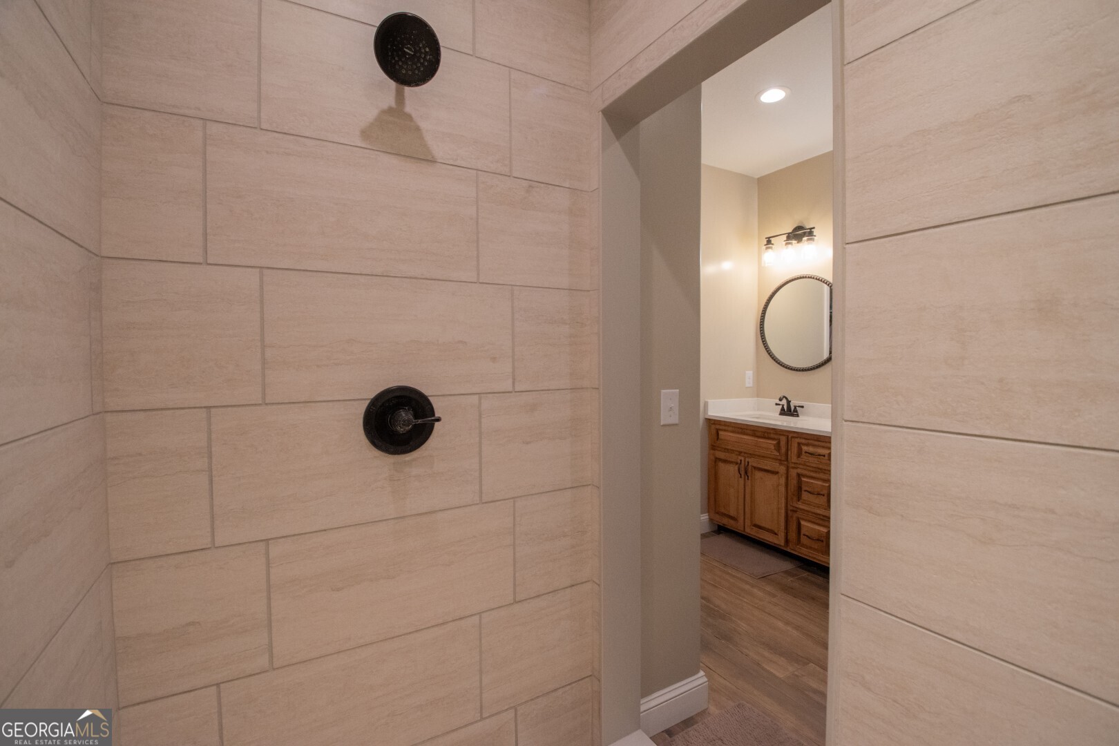 6213 Spanish Creek Road Folkston, GA 31537 - Photo 30 of 38 a bathroom with a shower and a mirror