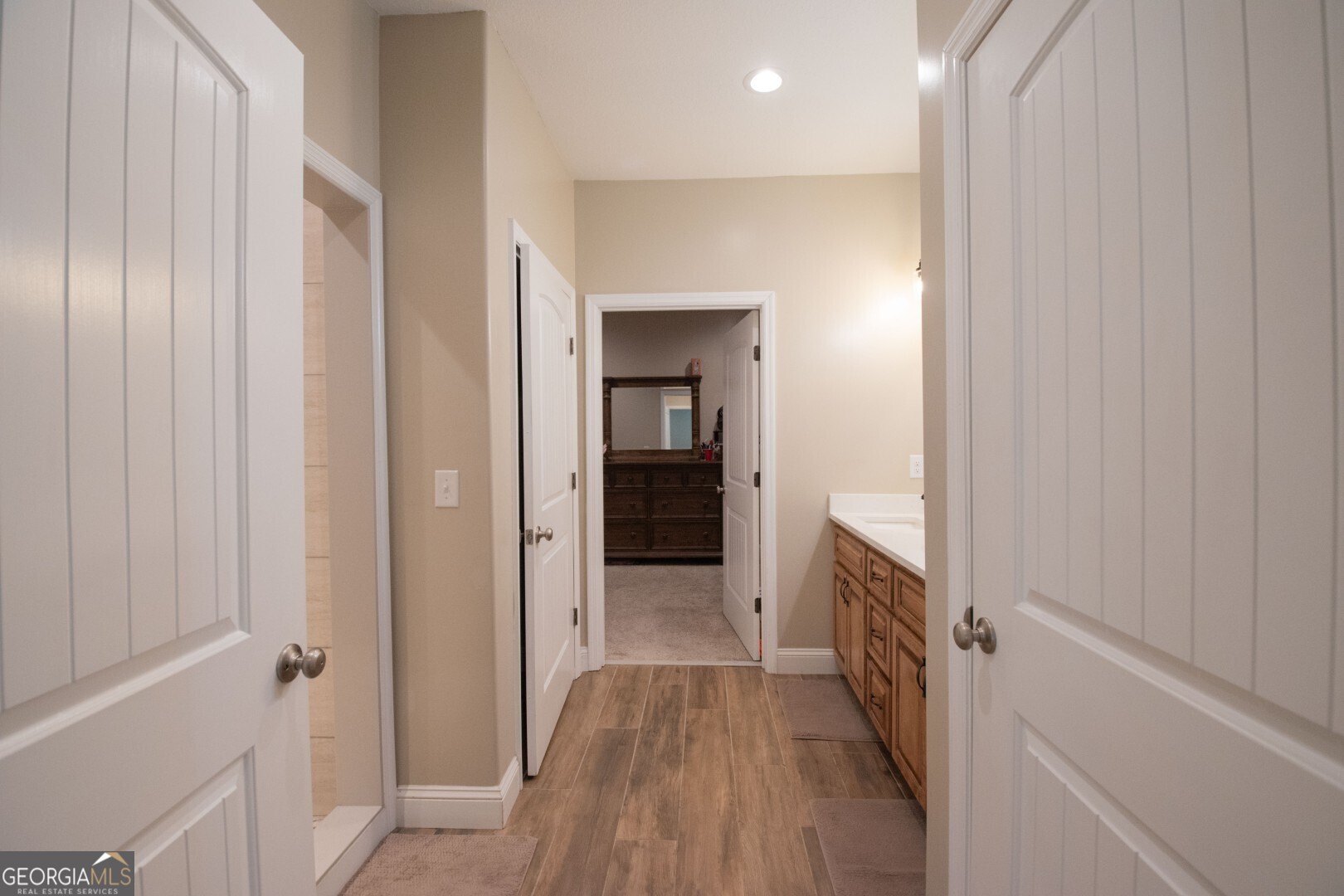6213 Spanish Creek Road Folkston, GA 31537 - Photo 31 of 38 a view of a hallway with wooden floor and staircase