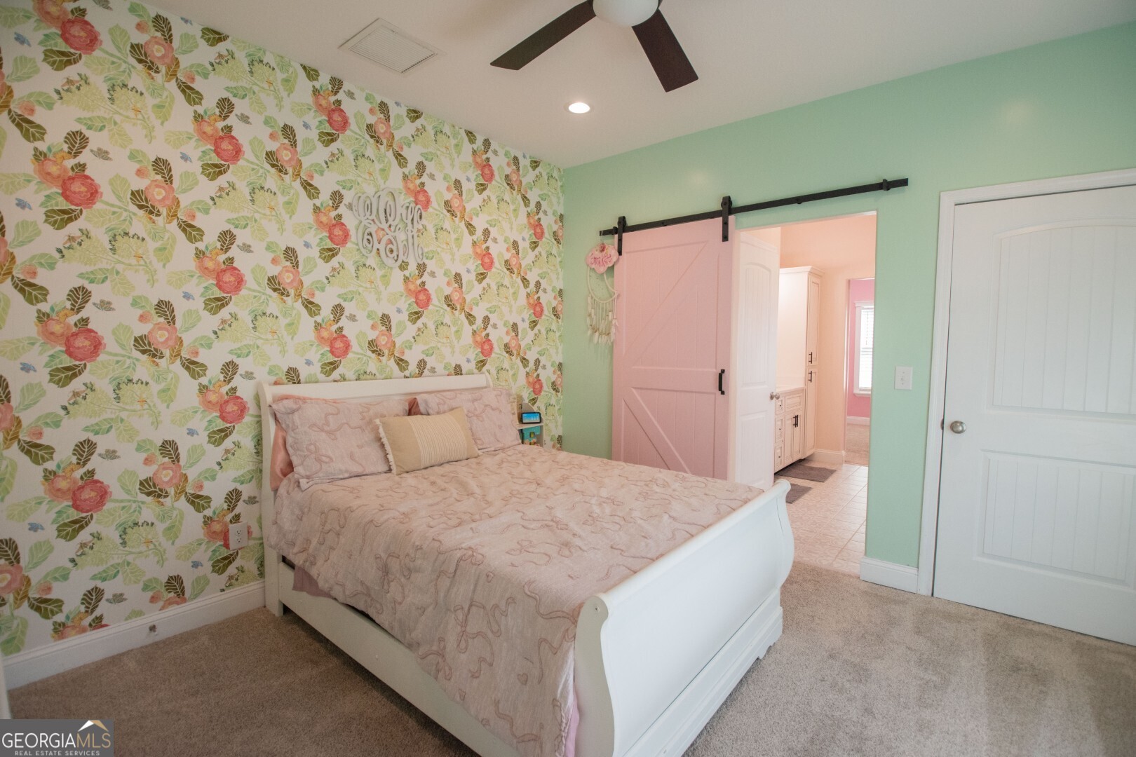 6213 Spanish Creek Road Folkston, GA 31537 - Photo 38 of 38 a bedroom with a bed and a painting on the wall