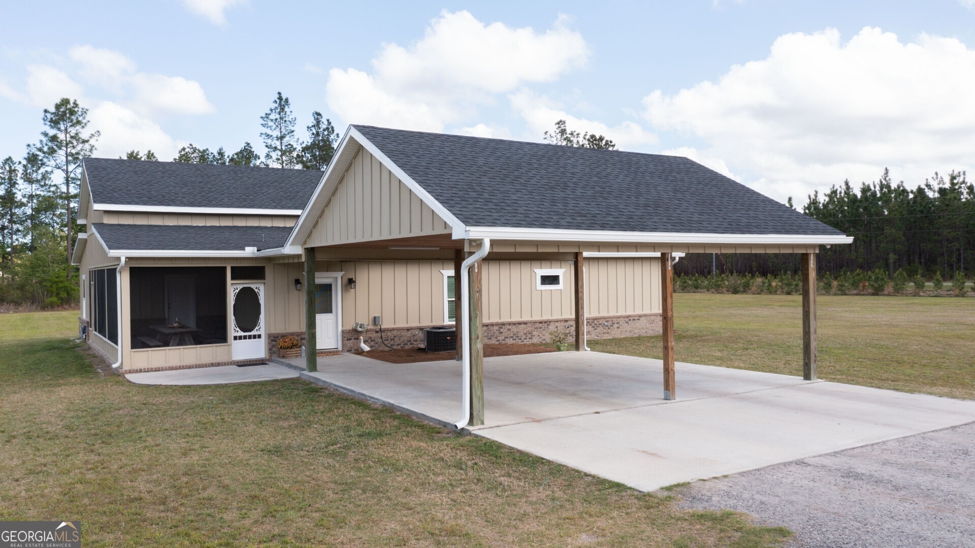 6213 Spanish Creek Road Folkston, GA 31537 - Photo 5 of 38 a view of a house with backyard and porch