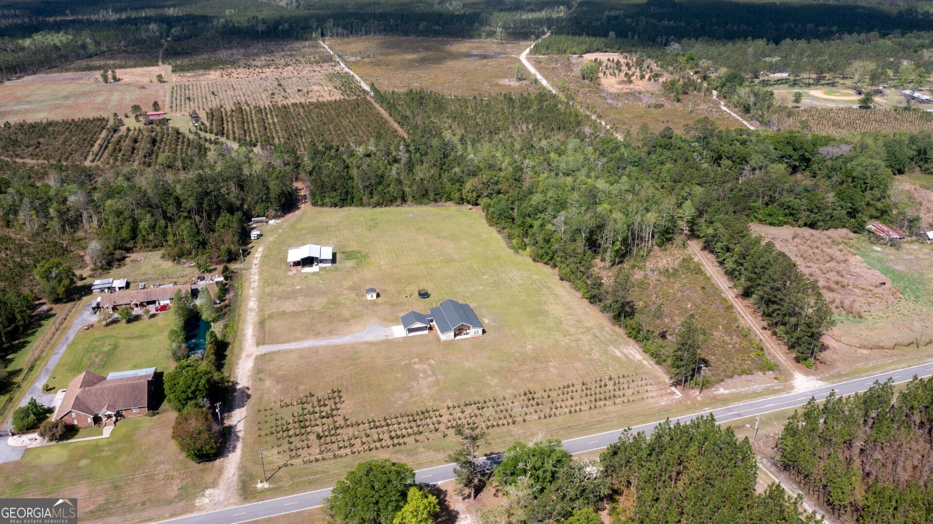 6213 Spanish Creek Road Folkston, GA 31537 - Photo 9 of 38 an aerial view of a house with a yard