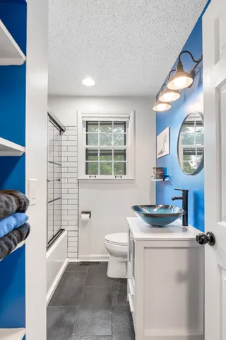 a view of bathroom with dual sinks