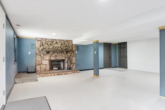 a view of a livingroom with a fireplace