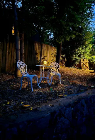 a backyard of a house with lots of green space