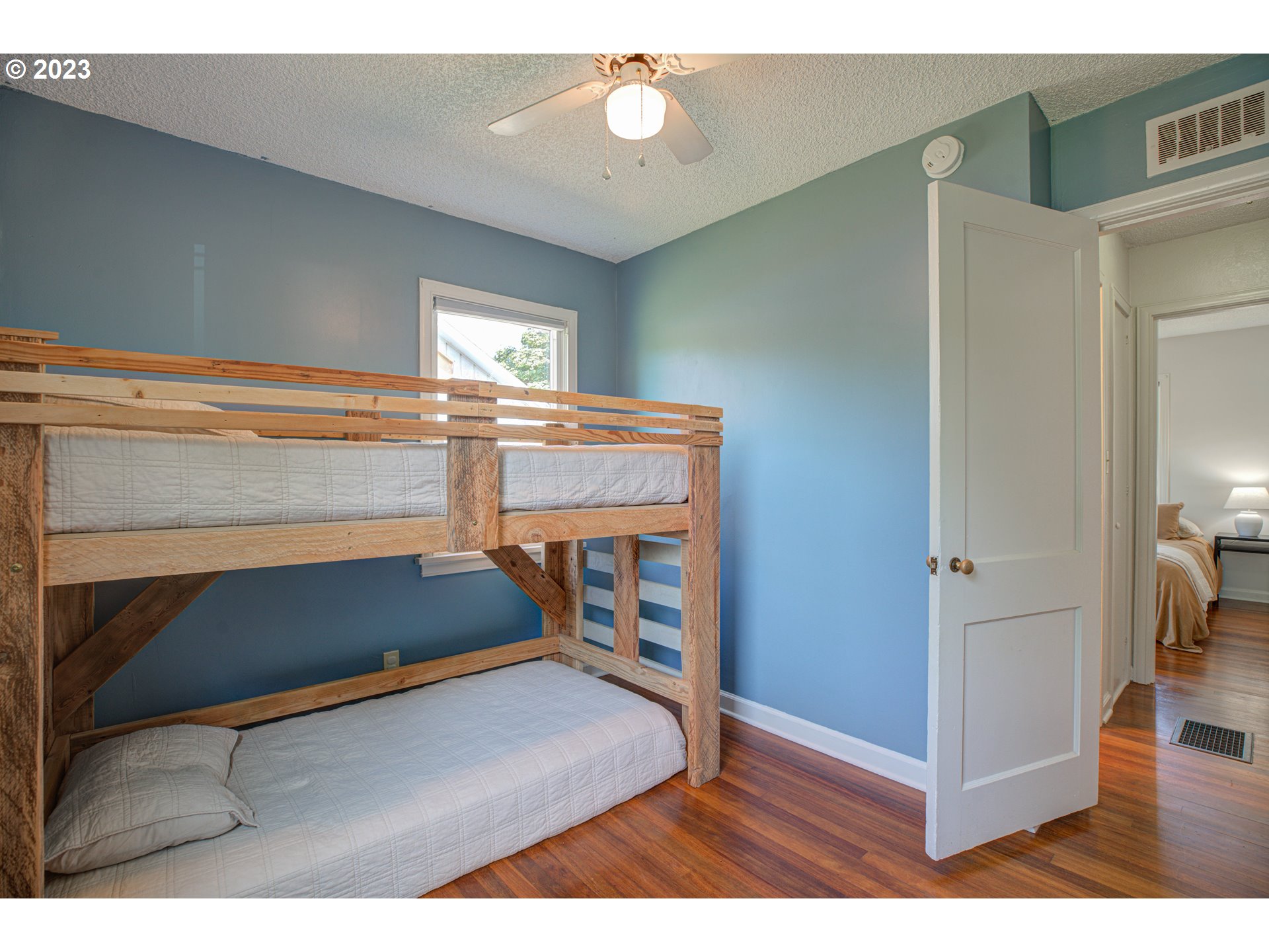 100 Maple Boulevard Wood Village, OR 97060 - Photo 24 of 37 a view of entryway and hall with wooden floor