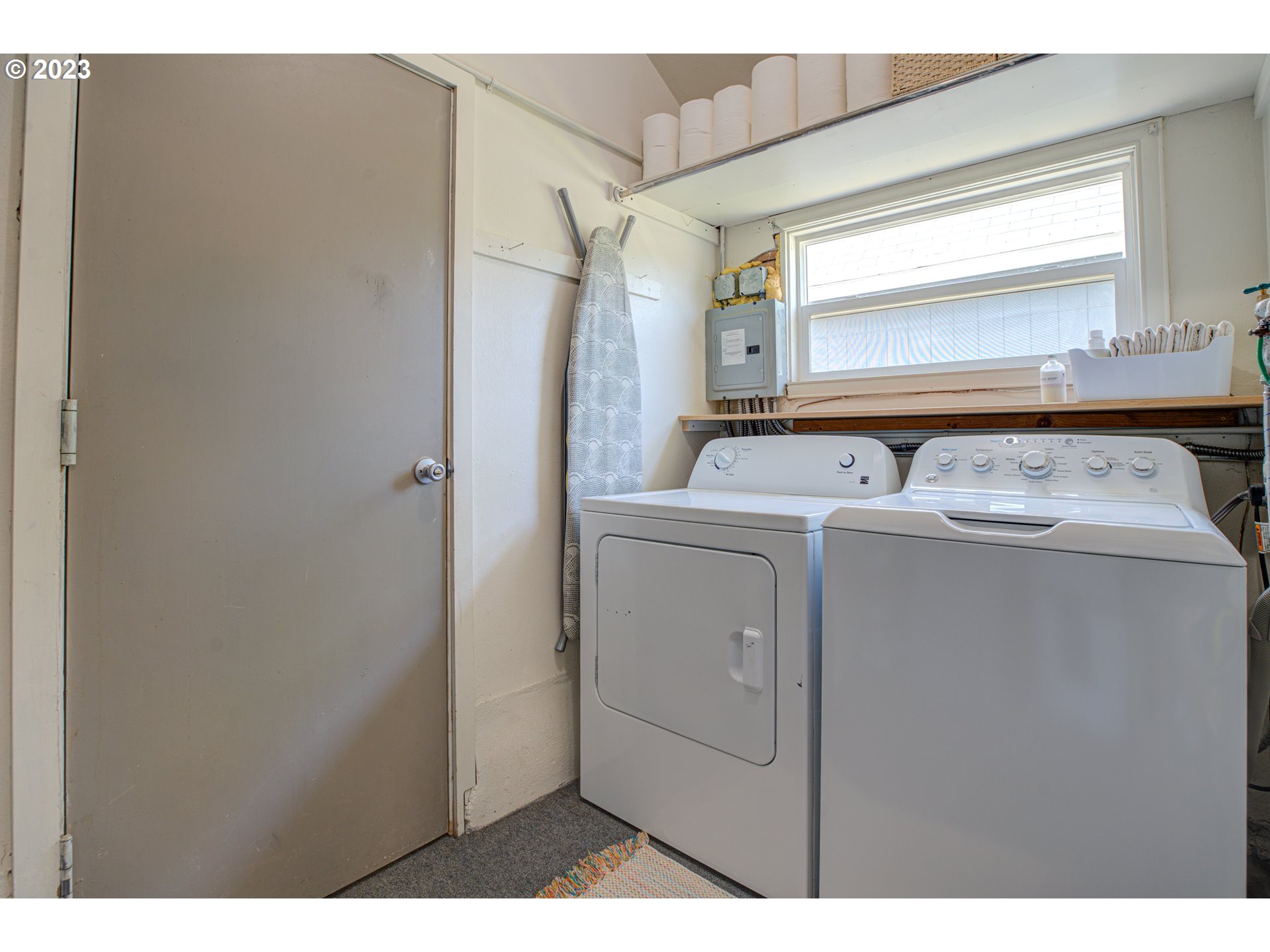 100 Maple Boulevard Wood Village, OR 97060 - Photo 27 of 37 a utility room with dryer and washer