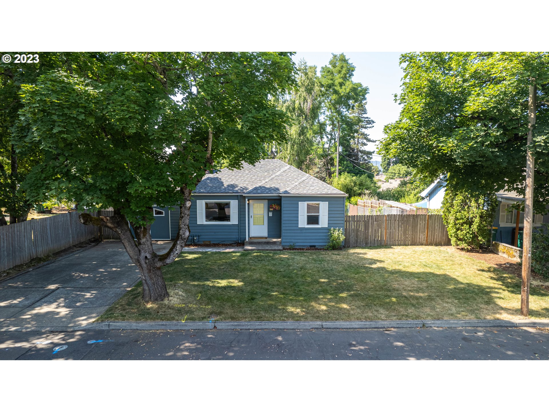 100 Maple Boulevard Wood Village, OR 97060 - Photo 3 of 37 a house view with a garden space