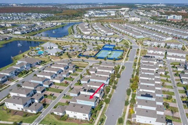 a view of swimming pool with outdoor seating