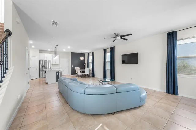 a room with furniture and windows