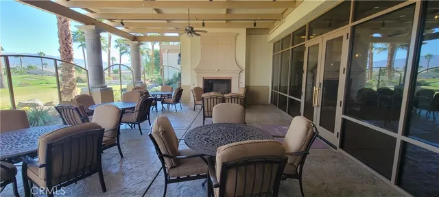 a view of a lake with a sitting area