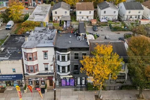 a front view of a building with street view