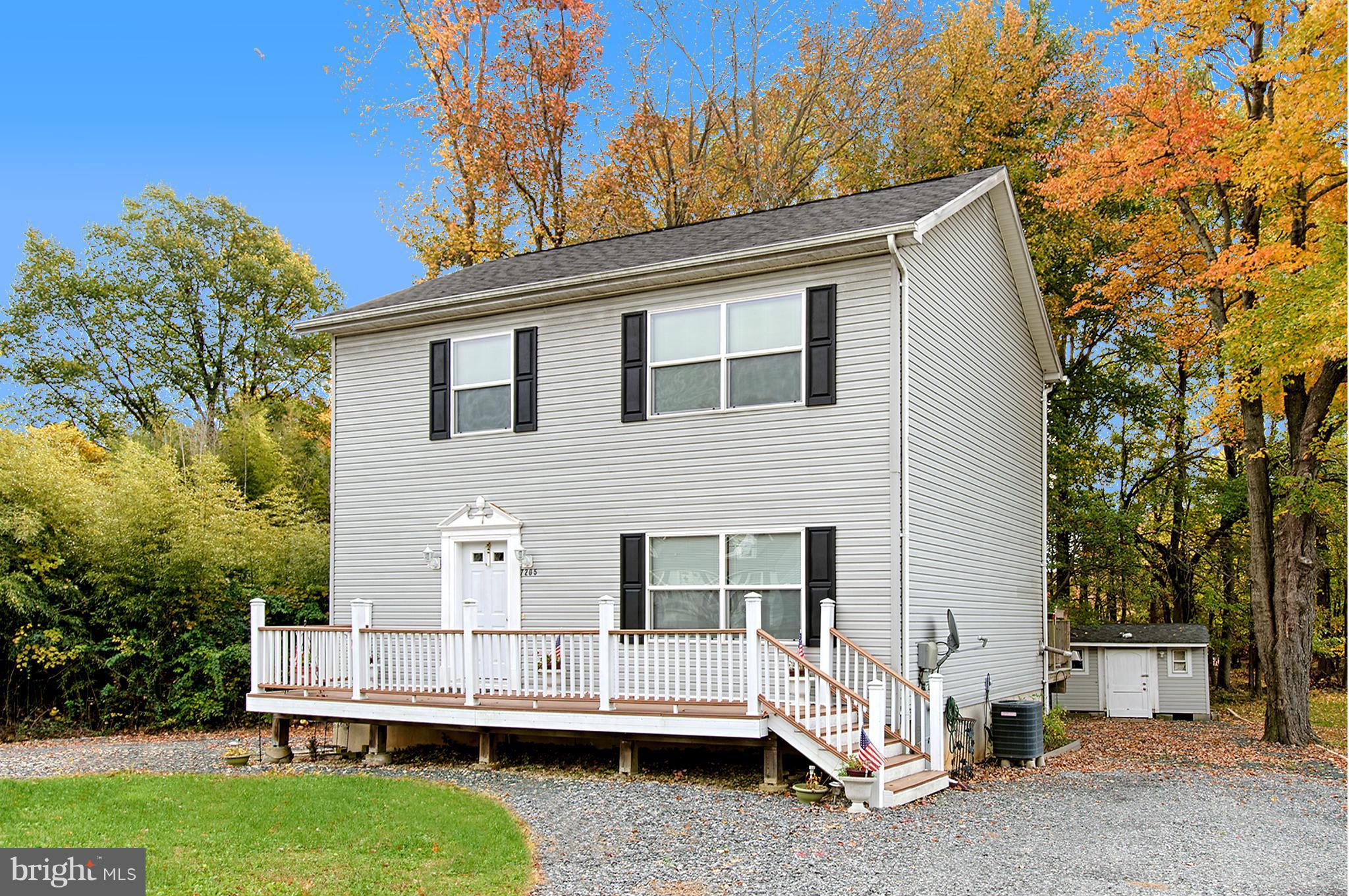 7205 Gunpowder Road Middle River, MD 21220 - Photo 2 of 25 a view of a house with a yard
