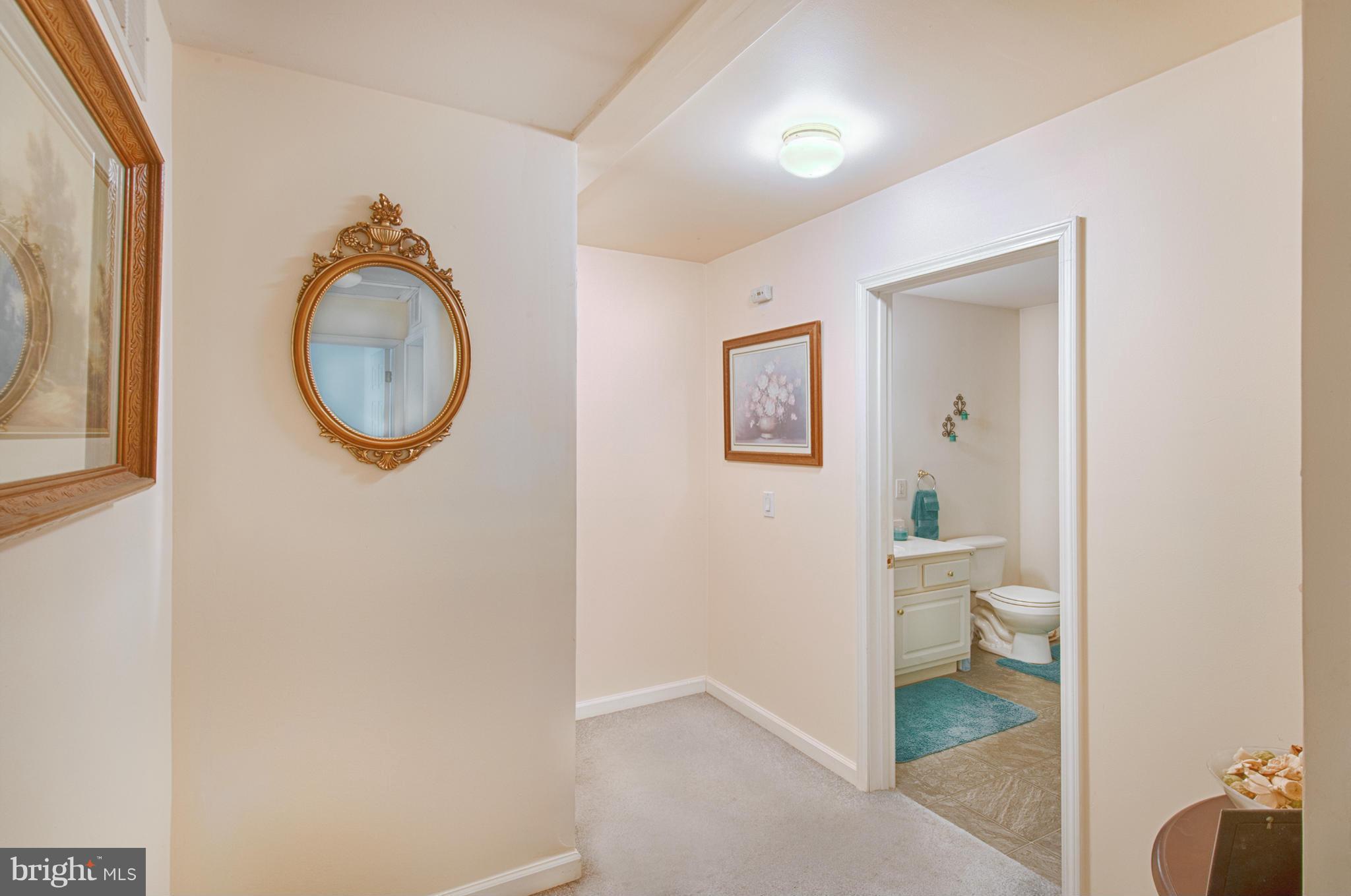 7205 Gunpowder Road Middle River, MD 21220 - Photo 18 of 25 a bathroom with a toilet and a sink