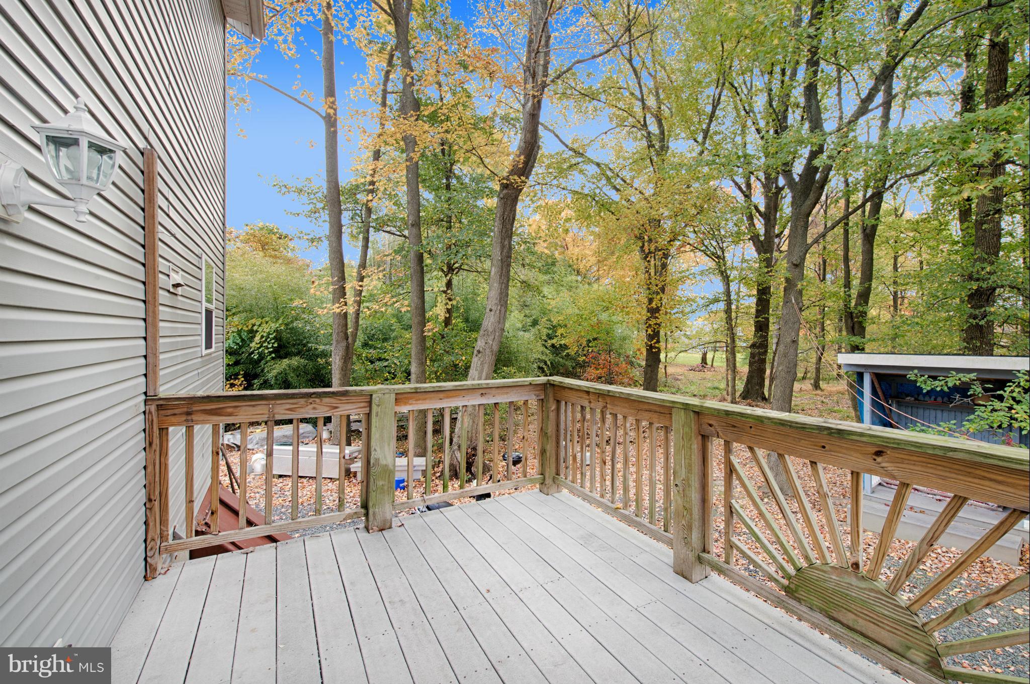 7205 Gunpowder Road Middle River, MD 21220 - Photo 23 of 25 a view of balcony with wooden floor and fence