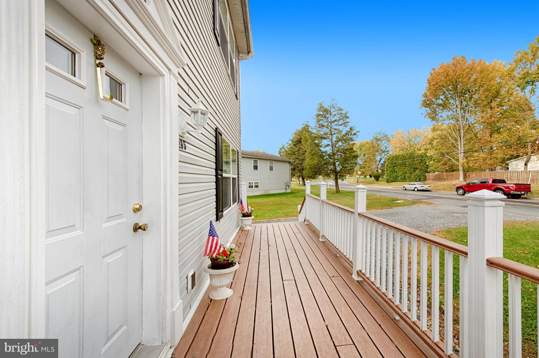 7205 Gunpowder Road Middle River, MD 21220 - Photo 5 of 25 a view of balcony with wooden floor and fence
