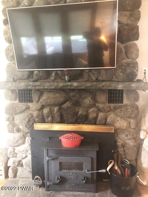 119 Spring Road Hawley, PA 18428 - Photo 11 of 31 Stone Fireplace in Living Room