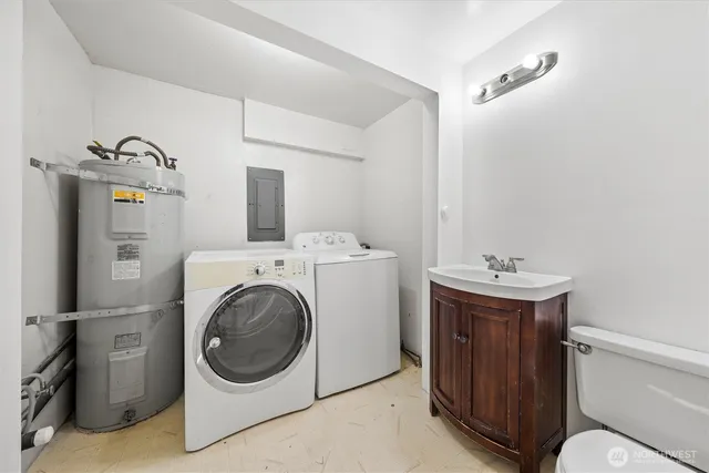 a utility room with dryer and washer
