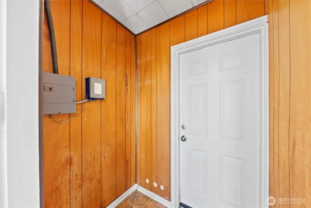 a view of a bathroom with shower and a window