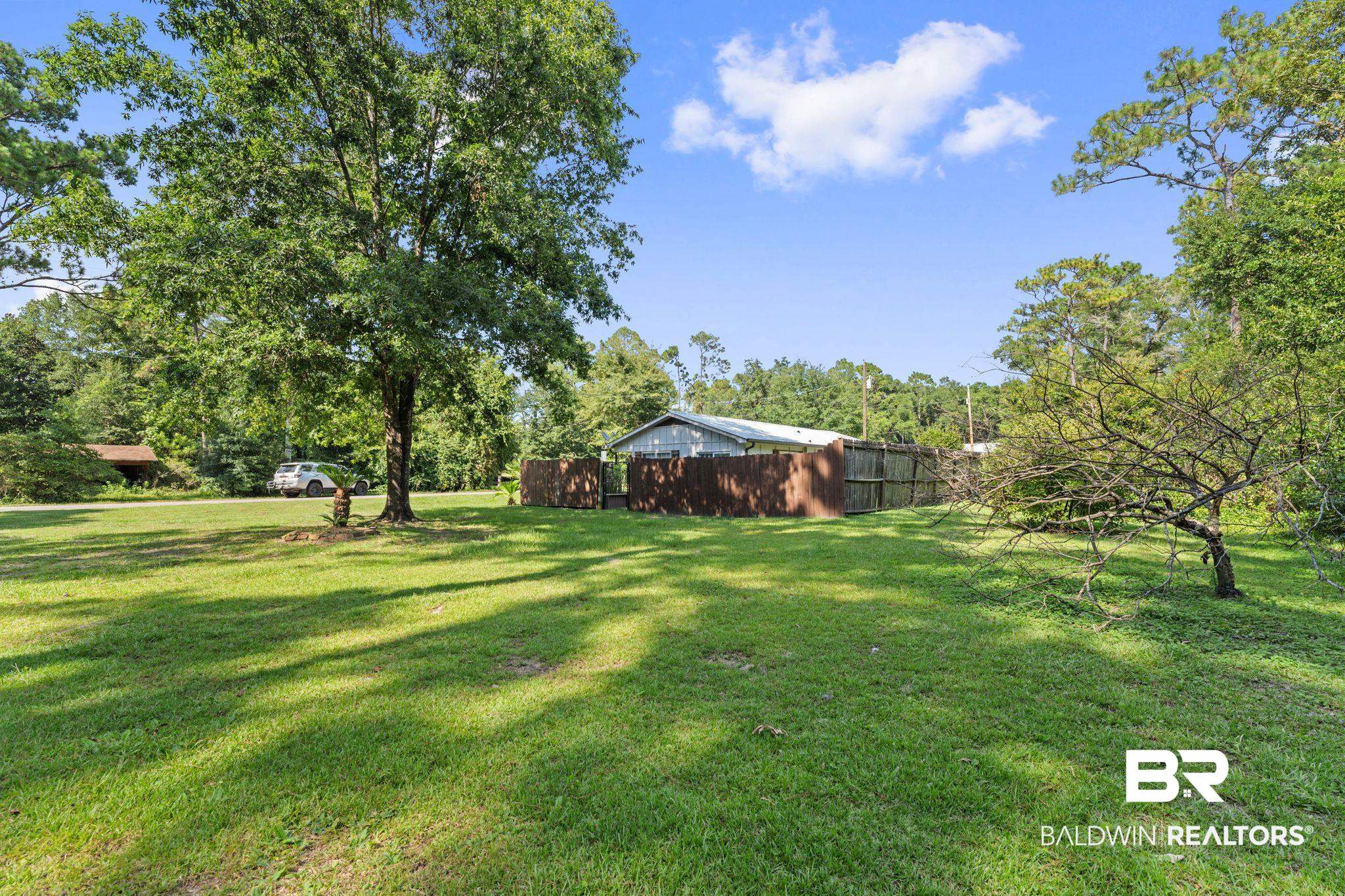 14095 Riverside Drive Foley, AL 36535 - Photo 28 of 30 View of green lawn