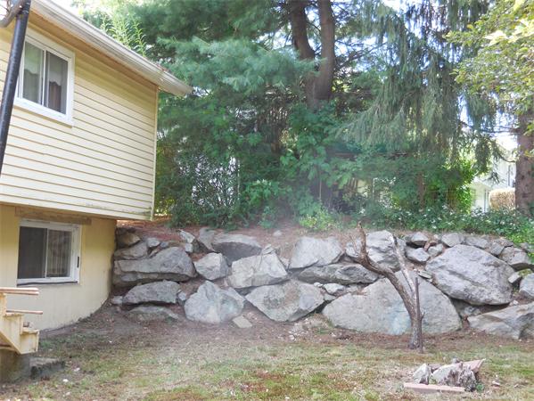 47 Joan Road Boston, MA 02136 - Photo 18 of 19 a view of a house with a yard