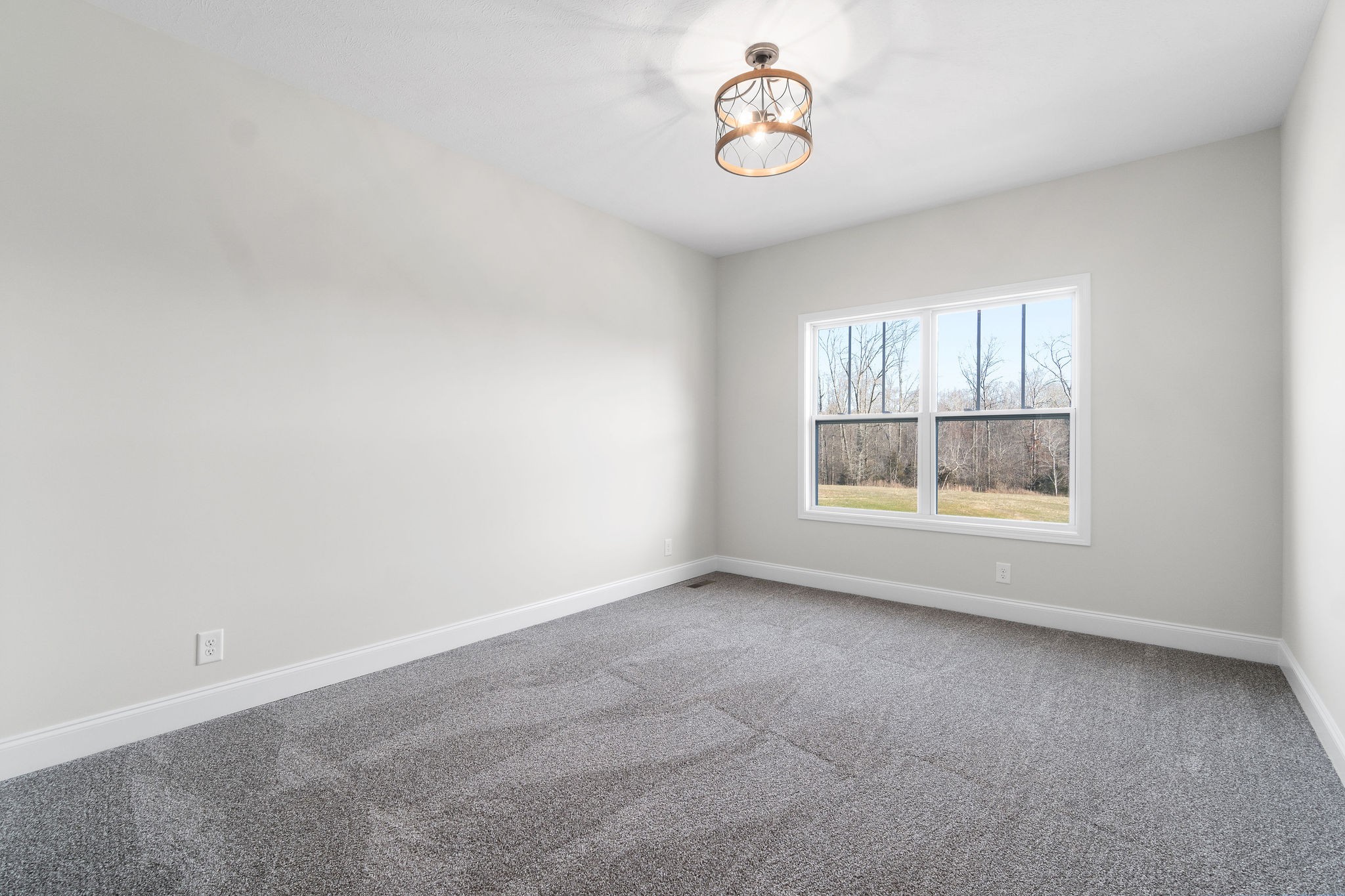 1387 Southside Road Southside, TN 37171 - Photo 22 of 34 an empty room with a empty space and a window
