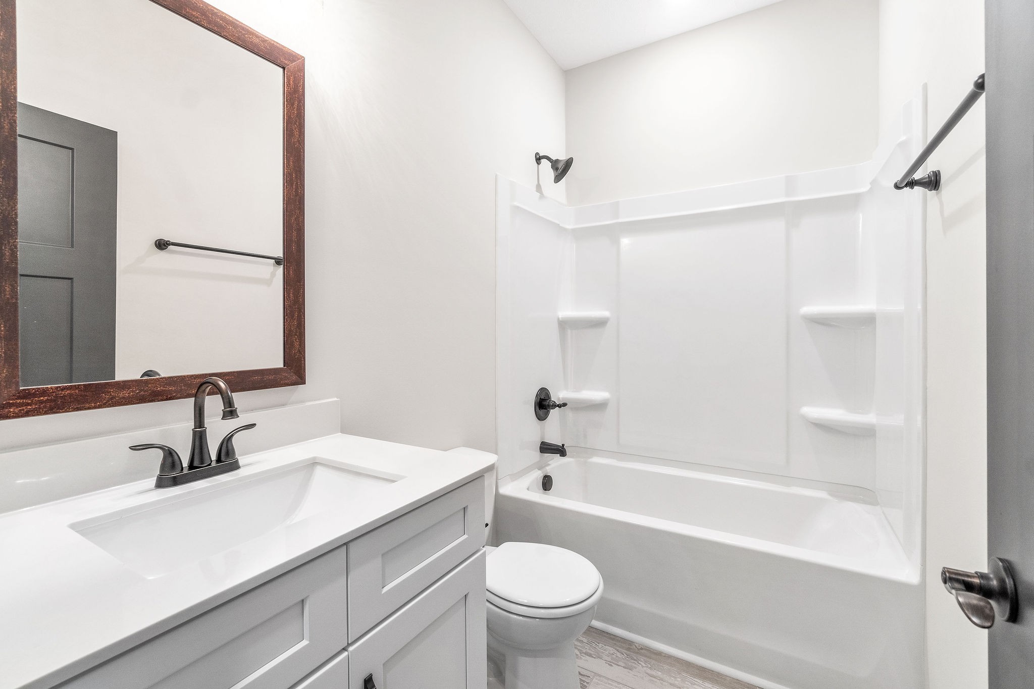 1387 Southside Road Southside, TN 37171 - Photo 23 of 34 a bathroom with a sink a toilet and a bathtub