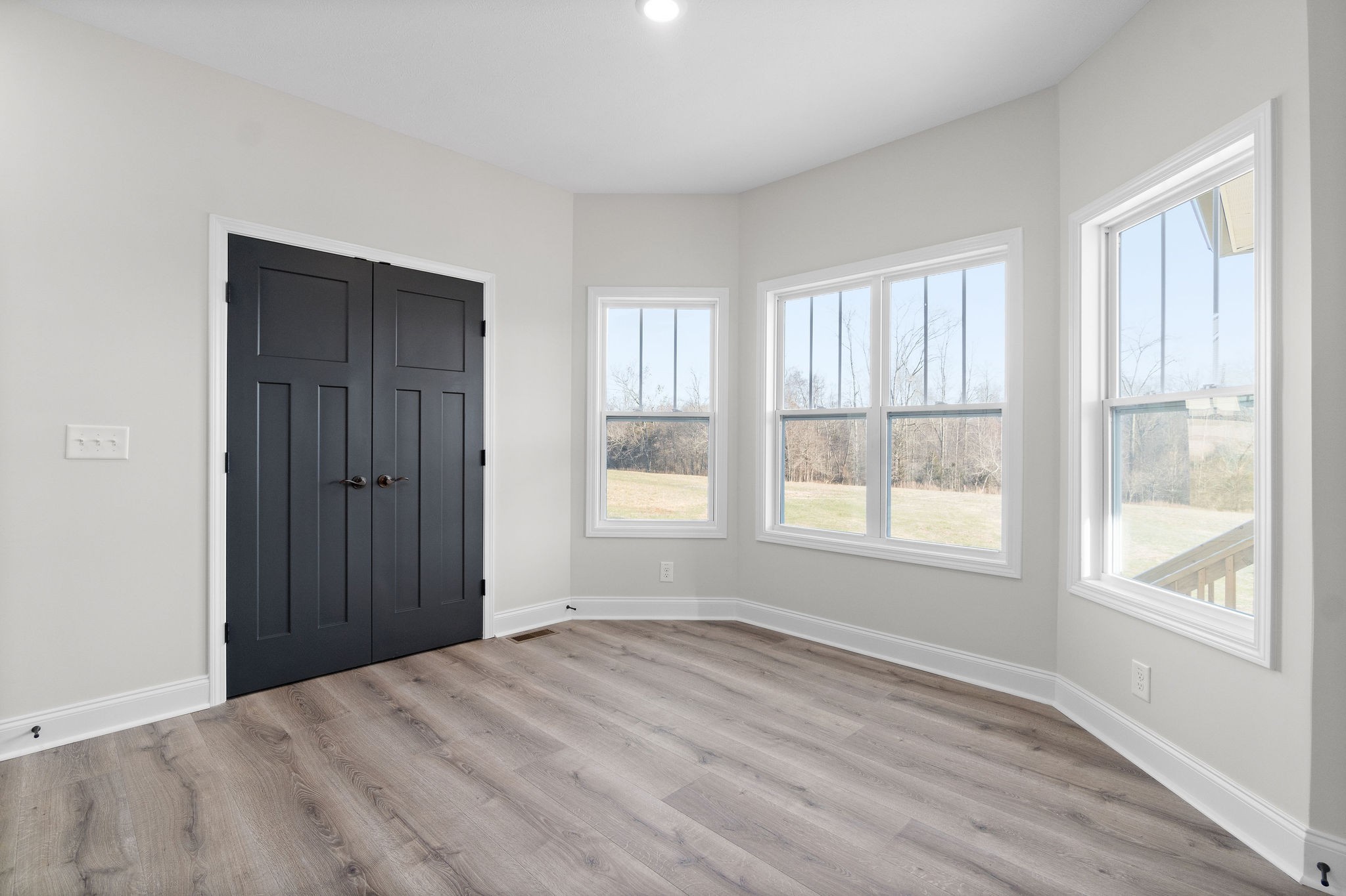 1387 Southside Road Southside, TN 37171 - Photo 8 of 34 a view of empty room with wooden floor and fan